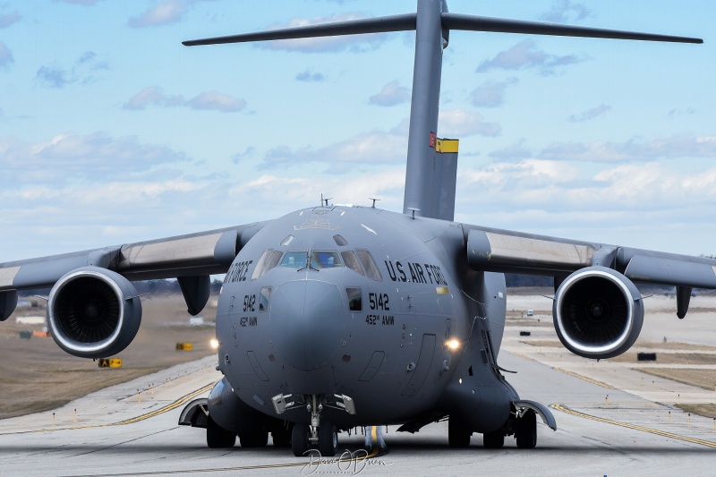 REACH4162
C-17A / 05-5142	
729th AS / March AFB
4/7/23 
Keywords: Military Aviation, KPSM, Pease, Portsmouth Airport, C-17, 729th AS