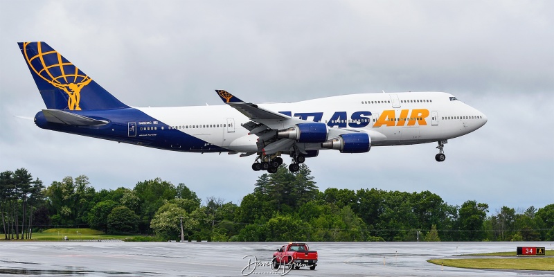 Atlas Air lines over the numbers for RW34
GIANT8042 / 747-400	
N482MC / Atlas Airlines
6/4/23
Keywords: KPSM, Pease, Portsmouth Airport, Atlas Airlines, 747