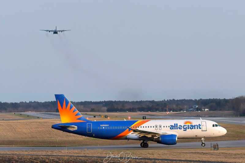 Allegiant holds while SKIER lifts off
C-130H / 84-0208	
139th AS / Schenectady NY
4/12/22
Keywords: Military Aviation, KPSM, Pease, Portsmouth Airport, C-130H, 139th AS