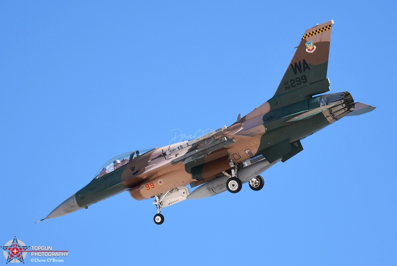 Gomer 01 landing RW 3L 
86-0299 wearing the Flogger paint scheme
F-16 Aggressor 64th AGRS

